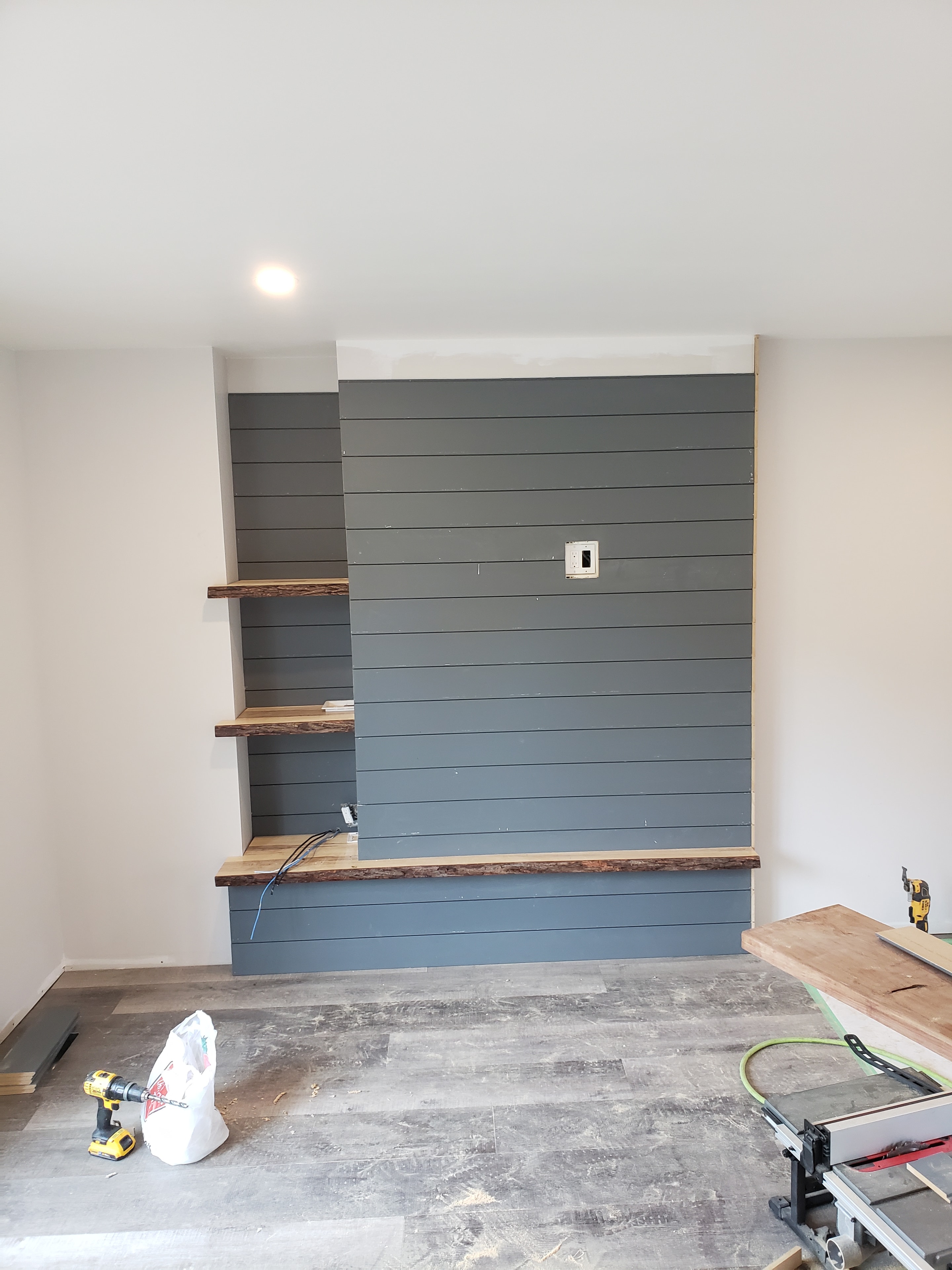 Interior wall shelving installation